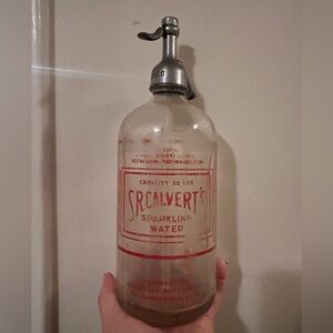 St Calverts seltzer bottle with OKeefes metal top. Antique Canadian collectable